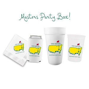 May include: A white Masters Party Box set including a napkin, can cooler, foam cup, and plastic cup. Each item features a yellow map graphic with a red flag, the text "THE SMITHS", and "MASTERS PARTY 2026". The text "Masters Party Box!" is written in green.
