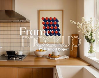 May include: A framed print with a geometric pattern of red and blue circles and a wooden frame hanging on a wall in a kitchen. The kitchen has a wood countertop, a stainless steel range hood, and a white sink.