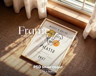May include: A wooden frame mockup with a white background and a black and yellow abstract design. The design includes the text "Musée d'Orsay", "Picasso", "Céramique Dessin", "Peinture", and "1947".
