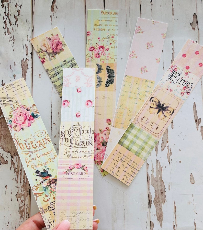 Puede incluir: Un conjunto de seis marcap&aacute;ginas de estilo vintage con dise&ntilde;os florales, texto escrito a mano y una mariposa. Los marcap&aacute;ginas est&aacute;n impresos en papel con un acabado texturizado y tienen un aspecto desgastado. Los marcap&aacute;ginas son perfectos para a&ntilde;adir un toque de encanto vintage a tus libros.