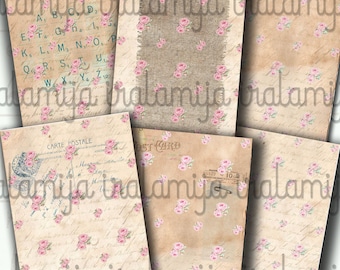 May include: A collection of vintage-style paper ephemera with a floral rose pattern. The papers feature a cream background with pink roses and handwritten script. Some pieces include text and a safety pin.