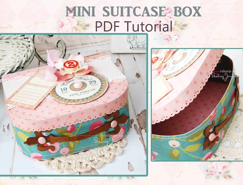 May include: A pink and blue mini suitcase box with a white lace trim, a brown leather handle, and a white tag with the text "Close Knit" and "Fine Thread".