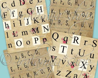 May include: Four vintage-style alphabet charts with a floral design. Each chart features the letters of the alphabet in a different arrangement. The charts are printed on a beige background with black lettering.