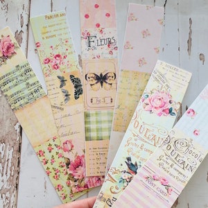 Puede incluir: Un conjunto de 10 marcap&aacute;ginas de estilo vintage con motivos florales, texto y un dise&ntilde;o de mariposa. Los marcap&aacute;ginas est&aacute;n impresos en papel con un acabado texturizado y tienen una gama de colores rosa claro y crema.