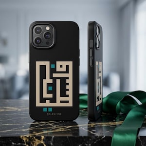 May include: A black smartphone case featuring a beige geometric Arabic calligraphy design with small teal square accents. The word PALESTINE is printed in small white capital letters at the bottom. The case has a camera cutout and side buttons.