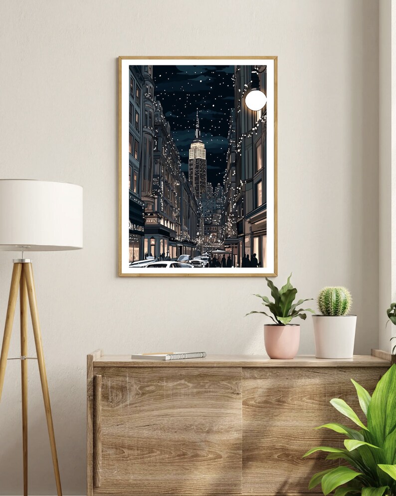 May include: A digital illustration of a city street at night with a tall skyscraper in the distance. The street is lined with buildings and decorated with string lights. A full moon is visible in the sky.