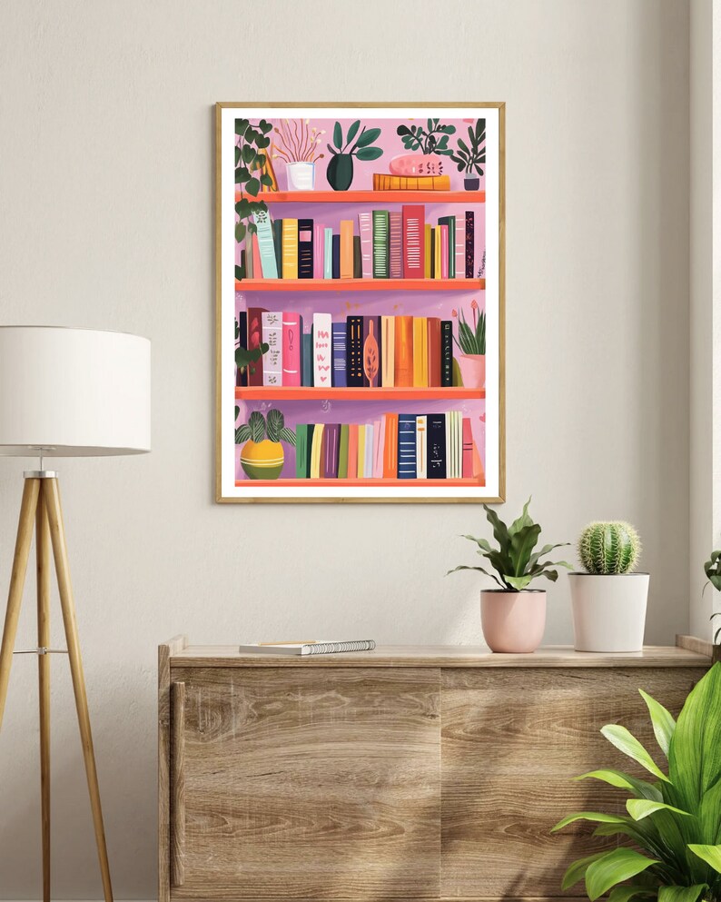 May include: A pink bookshelf with multiple shelves filled with colorful books and potted plants. The bookshelf is against a white wall.