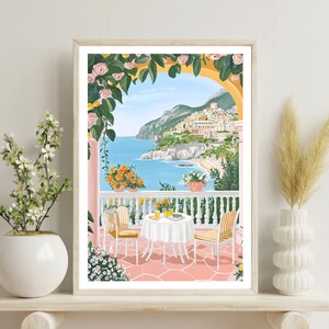 May include: A colorful illustration of a patio scene with a table and chairs set for a meal. The patio is decorated with flowers and overlooks a view of a coastal town and ocean.