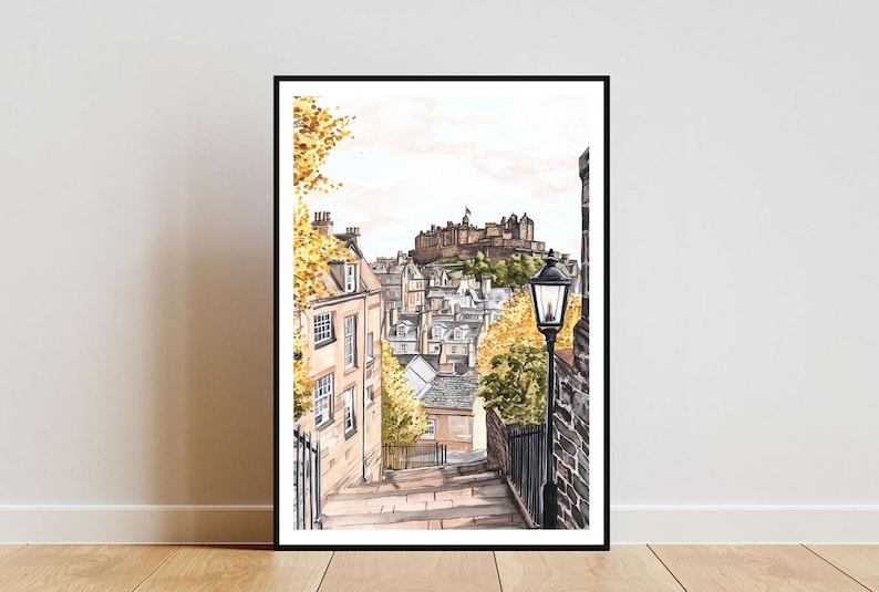 May include: A watercolour painting of a street scene in Edinburgh, Scotland. The painting shows a narrow street with buildings on either side, leading up to Edinburgh Castle in the distance. There is a street lamp in the foreground.