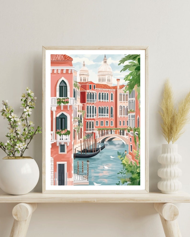 May include: A colorful illustration of a canal in Venice, Italy. The canal is lined with pink buildings and a bridge. There are gondolas in the water and green trees in the background.