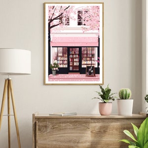 May include: A pink storefront with a sign that reads "BOOKSHOP" surrounded by a cherry blossom tree. The storefront has a large window with bookshelves filled with books. The sidewalk is covered in pink cherry blossoms.
