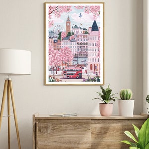 May include: A framed illustration of a London cityscape with a red double-decker bus, a Ferris wheel, and pink cherry blossoms.