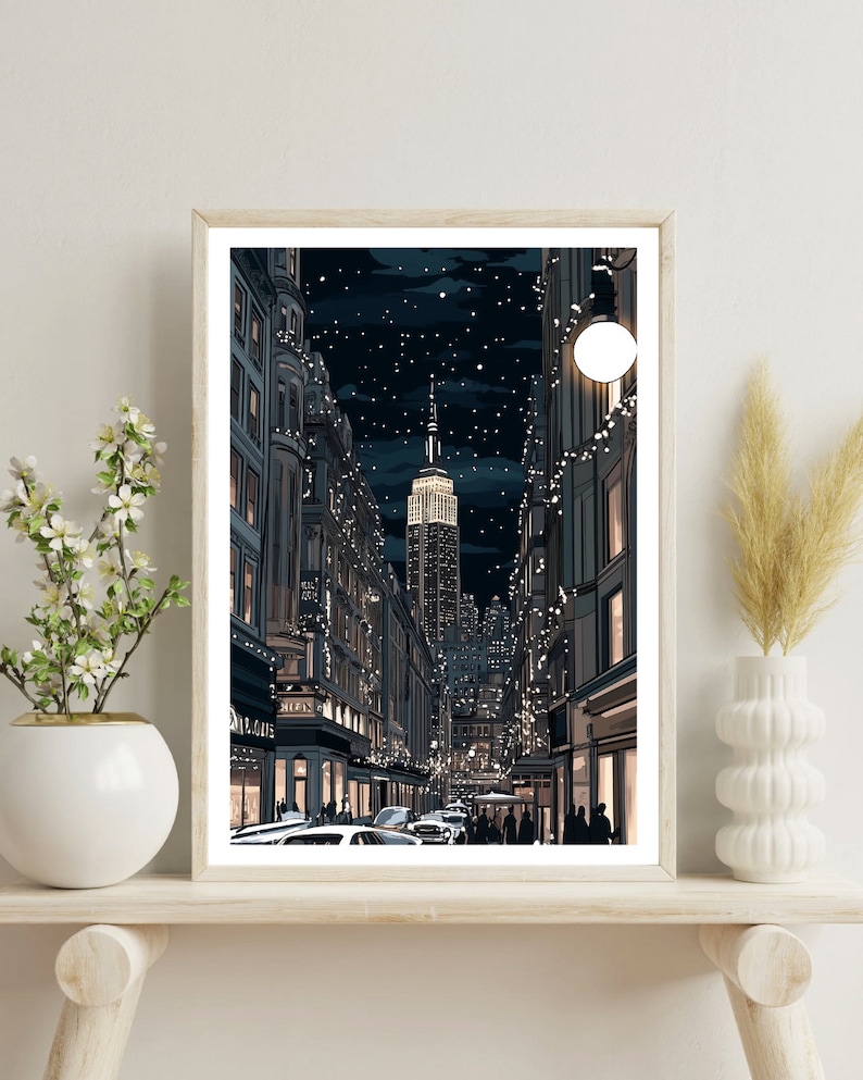 May include: A digital illustration of a nighttime cityscape with a tall skyscraper in the distance. The street is lined with buildings and decorated with string lights. The sky is dark blue with white stars.