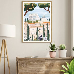 May include: A framed illustration of a cityscape with a white building in the background, surrounded by green trees and a blue sky.