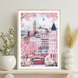 May include: A colorful illustration of London, England, with Big Ben, the London Eye, and a red double-decker bus. The scene is set in spring with cherry blossoms in bloom.