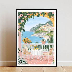 May include: A colorful illustration of a balcony overlooking a coastal town with a white table and two chairs. The balcony is decorated with pink and yellow flowers and greenery. The town is built on a cliffside with a blue ocean in the background.