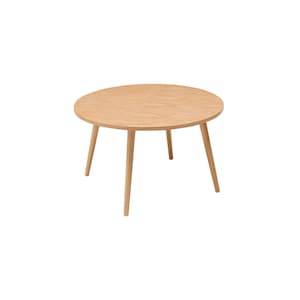 Pu&ograve; includere: Un tavolo rotondo in legno con una finitura marrone chiaro e quattro gambe sottili.