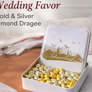 Grageas plateadas y almendras cubiertas de chocolate dorado: elegantes regalos de boda