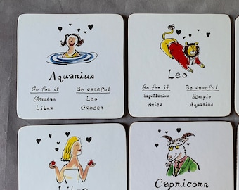 Set of 12 Zodiac coasters - 2002 Pottery Barn - very good condition - cute illustration and typography