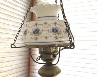 Vintage hanging hurricane lamp – milk glass floral shade with brass chains, swag light fixture, cottage style pendant lighting