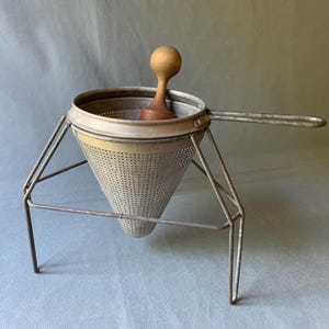 Vintage food mill - colander with pestle and stand
