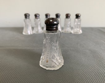 Antique glass salt shakers with silver lids - set of 7