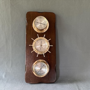 Vintage thermometer, hygrometer, barometer on wood - by Springfield