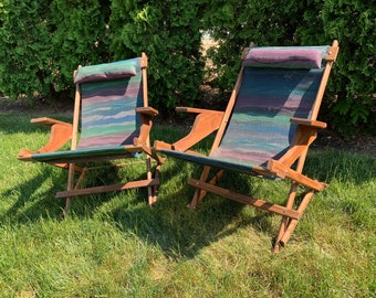 Pair of extremely comfortable wood framed lawn chairs - with mesh seats and neck pillow - slightly rocking - folding - easy transport