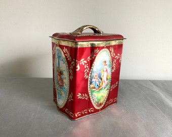 Bold and bright tea or biscuit tin featuring Cupid and Psyche - romantic scenes