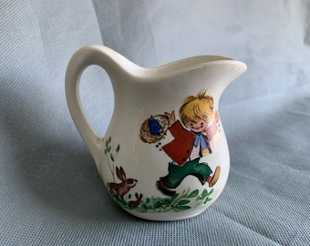 Little pitcher by McCoy -- featuring a boy and two bunnies - Made in USA