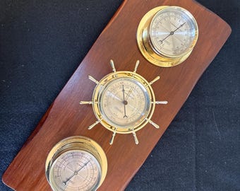Vintage thermometer, hygrometer, barometer on wood - by Springfield