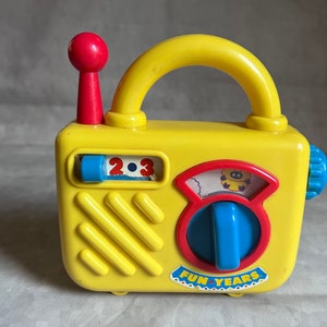 Vintage toy radio - 1990s Unimax - with clicks and music