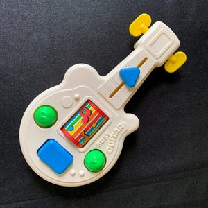 Playskool busy guitar - 1980s - with 5 activities