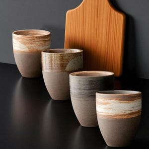 Taza de espresso japonesa artesanal: Taza de cerámica negra mate