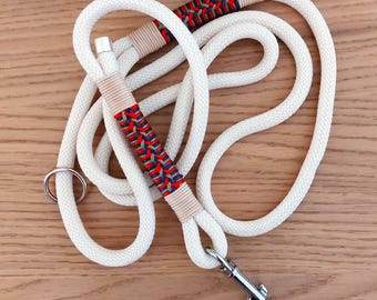 Correa de cuerda blanca para perro, ligera y duradera, con detalles de macramé de colores y mosquetón.