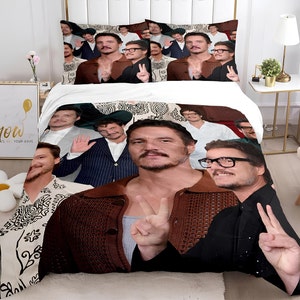 May include: A brown, black, and white duvet cover with a collage of images of a man with a beard and mustache. The man is making the peace sign with both hands. The duvet cover has a paisley pattern.