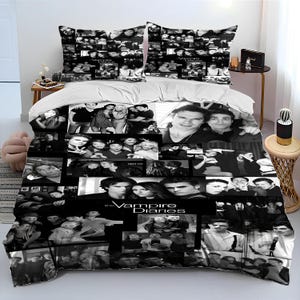 May include: Black and white bedding set featuring a collage of images from the TV show "The Vampire Diaries". The bedding set includes a duvet cover, two pillowcases, and a fitted sheet.