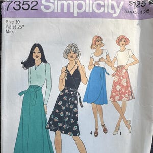 May include: Vintage Simplicity sewing pattern featuring illustrations of wrap skirts and tops. The pattern includes a size 10 with a 25-inch waist. The cover has a purple banner with the Simplicity logo and the price $1.25.