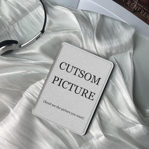 May include: A gray, textured, rectangular case with the text "CUTSOM PICTURE (Send me the picture you want)" printed in black.