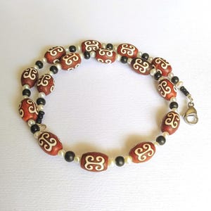 Necklace with Antique Agate Tibetian Dzi Beads with Triple  "Health and Prosperity" symbols: Pearl and Ebony wood accents