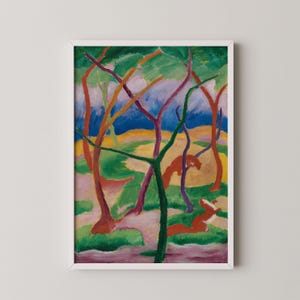 May include: A framed abstract painting of a forest scene. The artwork features stylized trees with red, orange, and purple trunks, set against a backdrop of green foliage, a yellow field, and a blue sky. The painting has a vibrant, colorful palette.