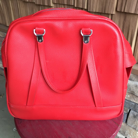 american tourister red bag