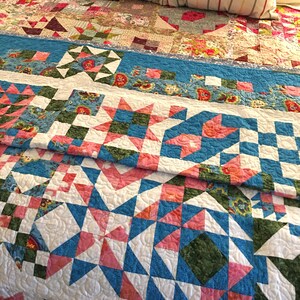 “The Ladies” quilt block sampler pattern book with  68 - Eight by Eight Inch quilt pattern blocks, quilt blocks not too small and not too large. And this quilt pattern is from The Quilt Ladies.