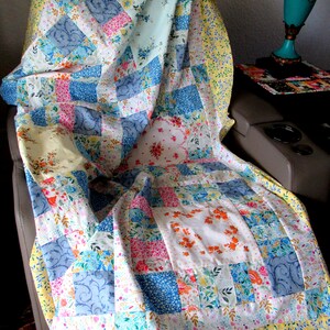 Hankie Quilt Pattern FOUR different Center block sizes:
8-inch49”x 68”
10-inch  53”x74”
12-inch 57” x 80”
14-inch  61” x 86”
16-inch 65” x 92”
Complete cutting, sewing instructions included, from The Quilt Ladies
