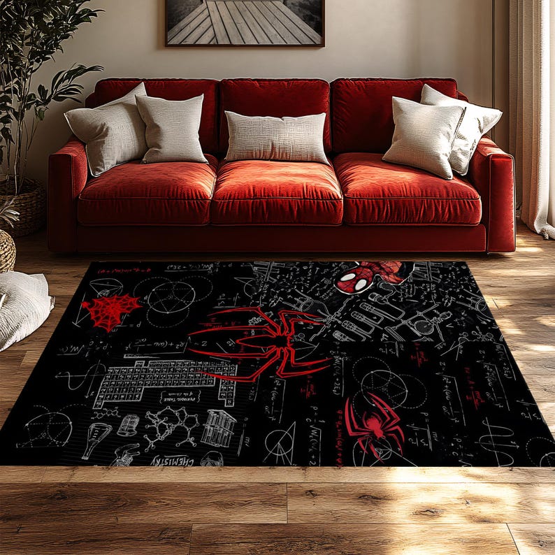 May include: Black rectangular area rug featuring a red and white Spider-Man design. The rug has a black background with white scientific diagrams and red spider illustrations. The rug is placed on a wooden floor in front of a red sofa.