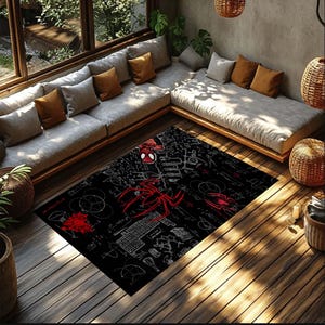 May include: Black rectangular area rug featuring a red and white Spider-Man design. The rug has a detailed graphic of the character, along with mathematical equations and a keyboard. The rug is placed on a wooden floor.
