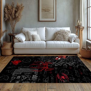 May include: Black rectangular area rug featuring a red and white spider design with scientific diagrams and equations. The rug has a black background with white and red accents, suitable for a living room.
