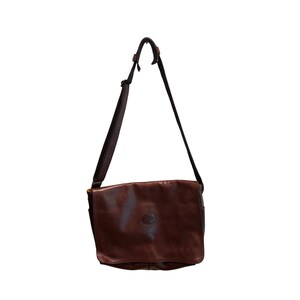 Brown Leather Saddle Bag with lots of pockets