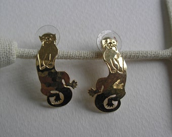 Vintage Artisan Signed Wild Byrde Hammered Metal Hammered Otter Earrings