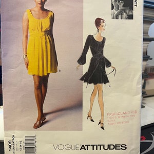 May include: A sewing pattern for a sleeveless dress with a scoop neck and a tie at the waist. The pattern is for sizes 12-14-16. The pattern is from Vogue Attitudes and is designed by Tom & Linda Platt.